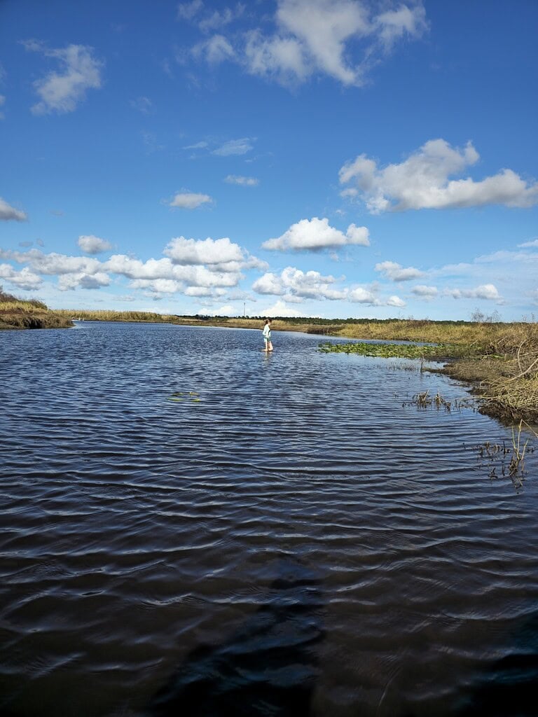 Child playing in the Econlockhatchee River